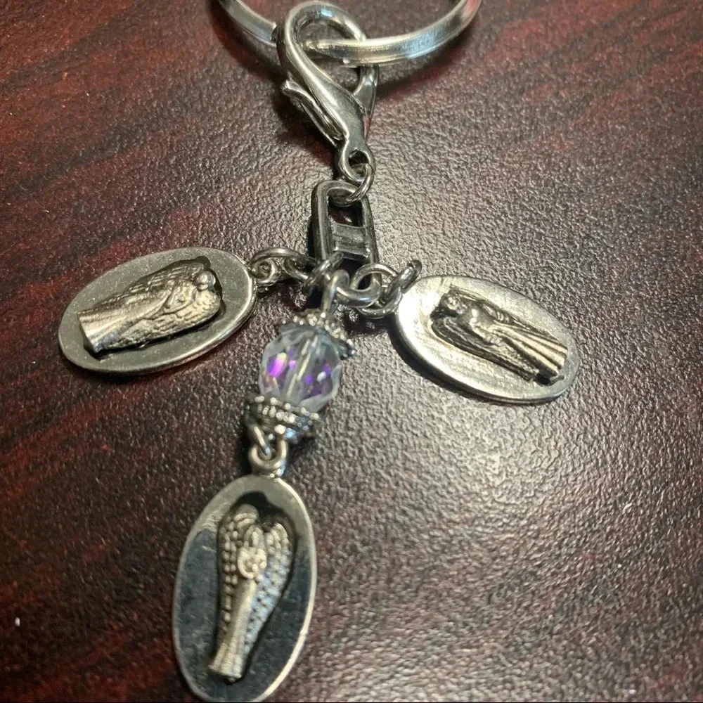 Avon trinity of angels key chain silver tone 4 inches long